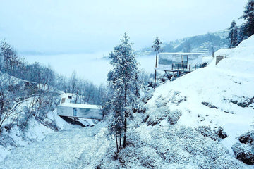 Collection of 18 mirrored mountain cabins form hotel in Hubei province