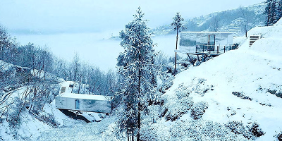 IN CHINA,ANORDIC-STYLE HOTELIS AN ARCHIPELAGO OF CABINSAND REFUGES REFLECTING THE NEARBY NATURE